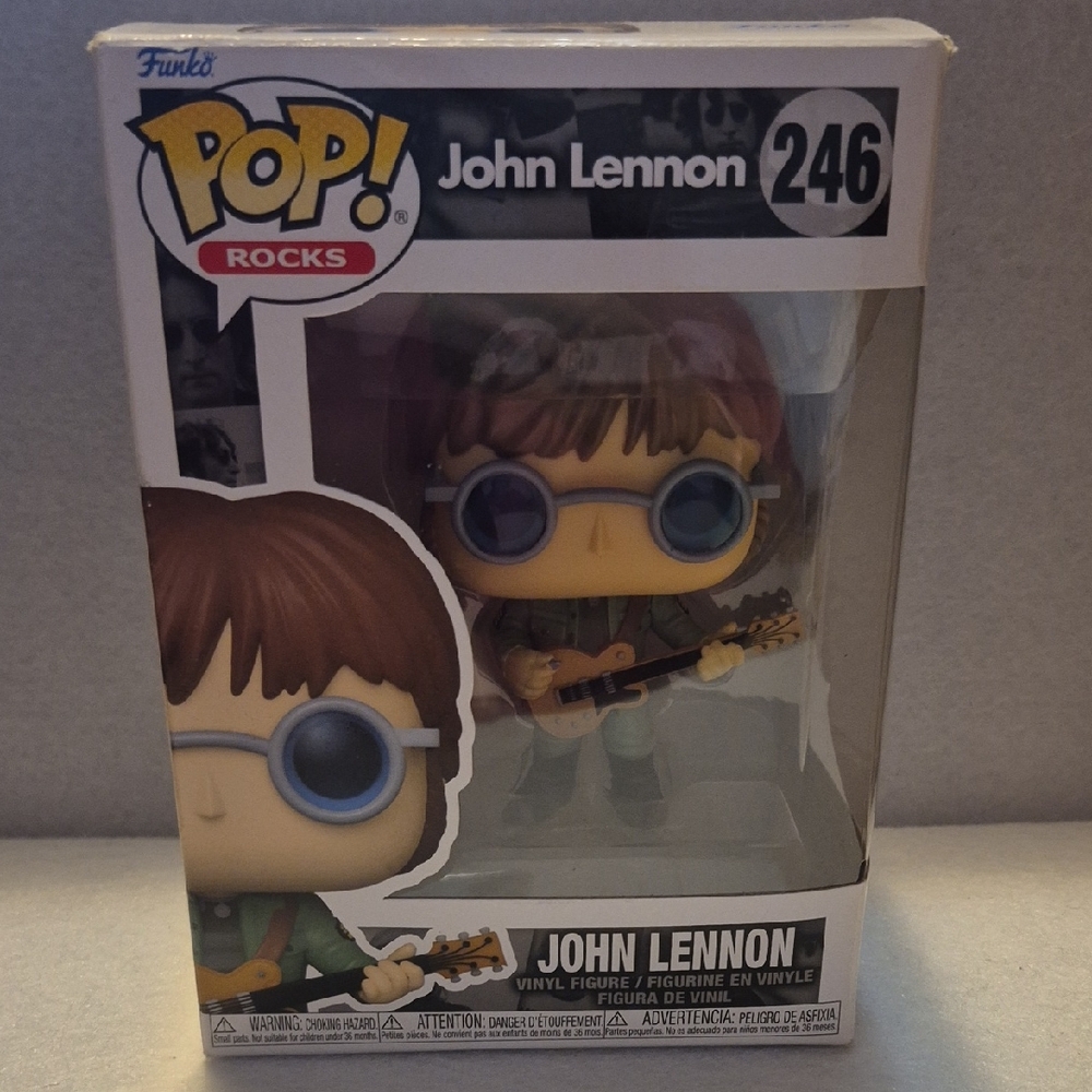 Funko Pop! Rocks Figure with Blue Glasses and Brown Hair